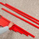 Montessori-Material rote Stangen